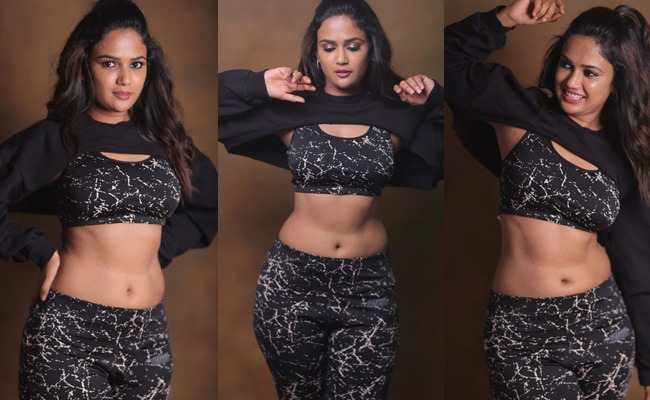 Pics: Ariyana Boasts Her Curves In Sports Bra