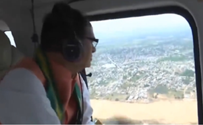 Chouhan undertakes aerial survey of flood-hit Khammam