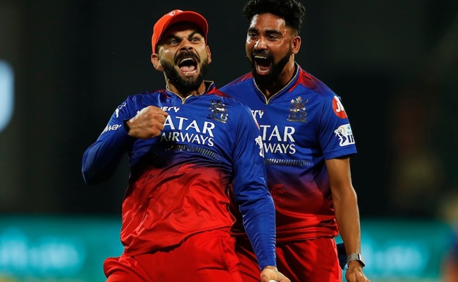 RCB hold nerve to knock CSK out and make playoffs