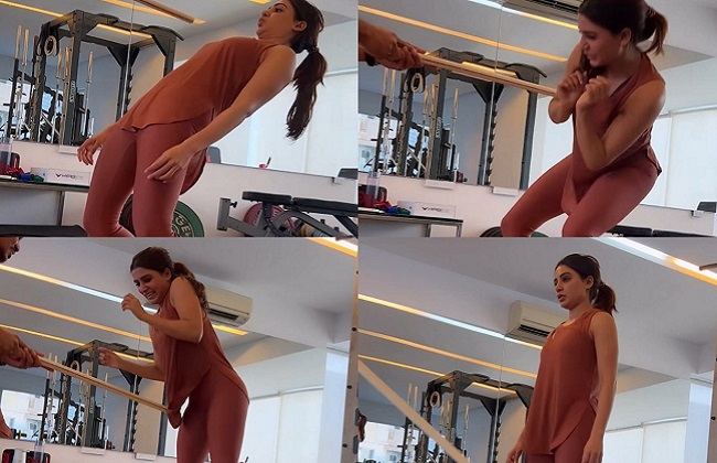 Using 'Nagin' drill, Samantha's trainer assesses her mobility