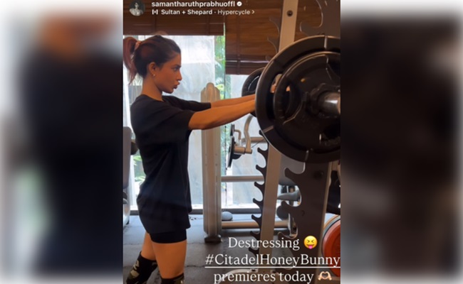 Samantha de-stresses herself by doing squats