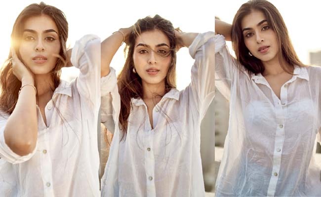 Pics: Slim Lady Goes Sensuous In White