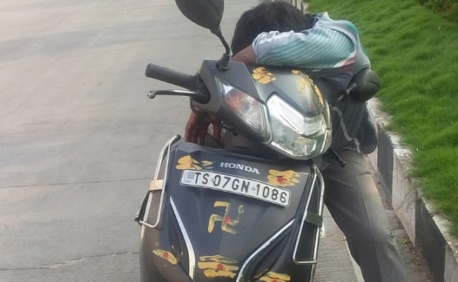 Man tipsy, falls asleep on bike in Hyderabad